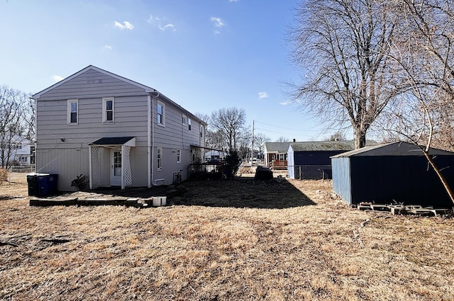 view of property exterior featuring a storage unit and an outdoor structure