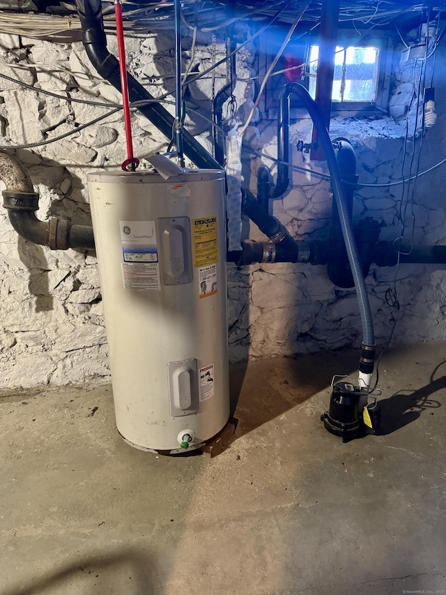 utility room with water heater