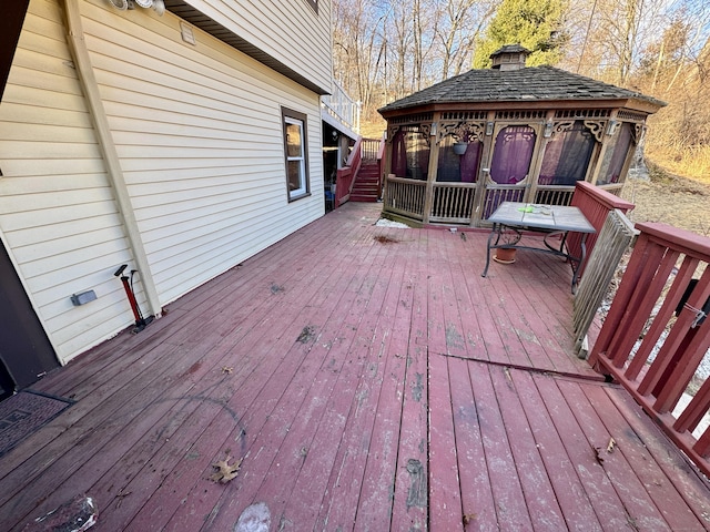 wooden deck featuring a gazebo