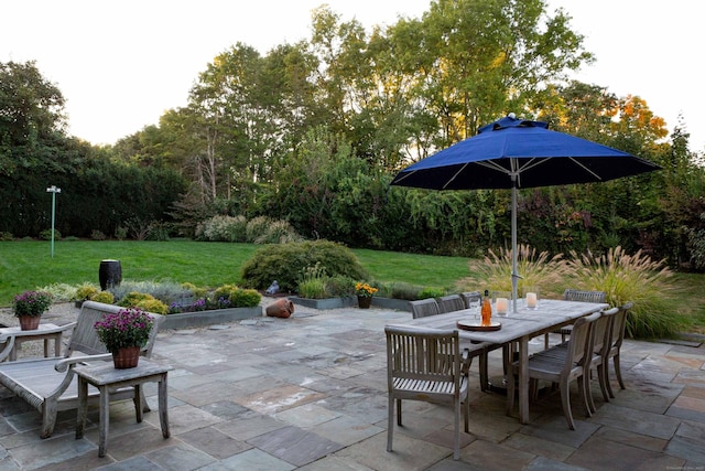 view of patio with outdoor dining area