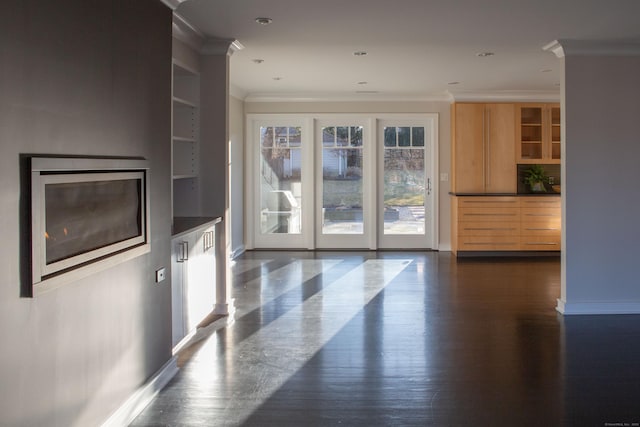 9 Schiller Rd, Fairfield, CT 06825 - unfurnished living room with dark wood-style floors, baseboards, and ornamental molding