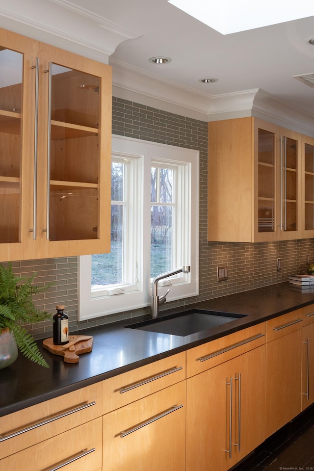 9 Schiller Rd, Fairfield, CT 06825 - kitchen featuring visible vents, ornamental molding, a sink, tasteful backsplash, and dark countertops