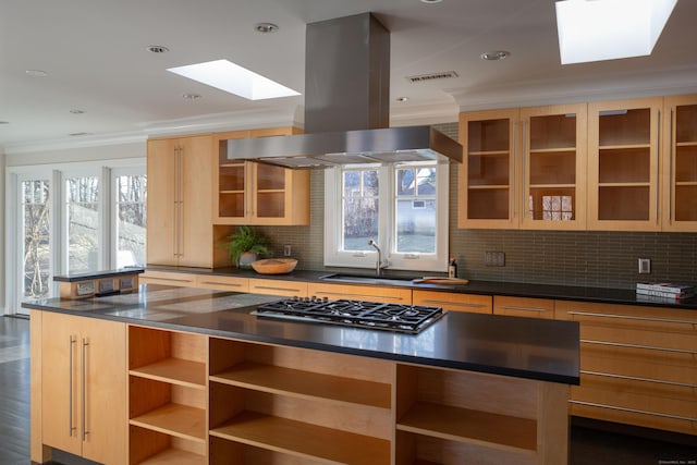 9 Schiller Rd, Fairfield, CT 06825 - kitchen featuring visible vents, island exhaust hood, a sink, stainless steel gas stovetop, and dark countertops
