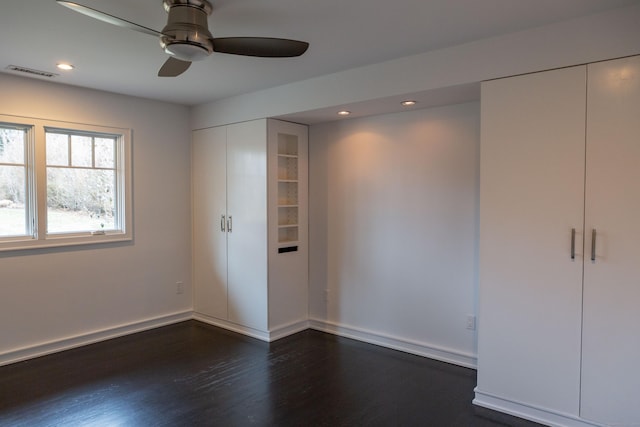 9 Schiller Rd, Fairfield, CT 06825 - unfurnished bedroom with dark wood finished floors, recessed lighting, visible vents, and baseboards
