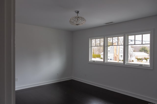 9 Schiller Rd, Fairfield, CT 06825 - spare room featuring dark wood finished floors, visible vents, and baseboards