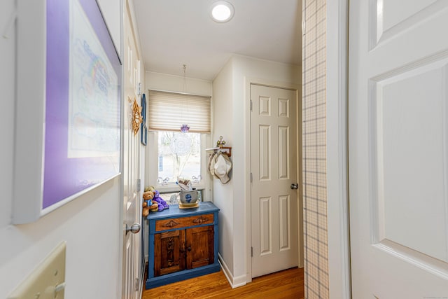 hallway featuring light wood-type flooring