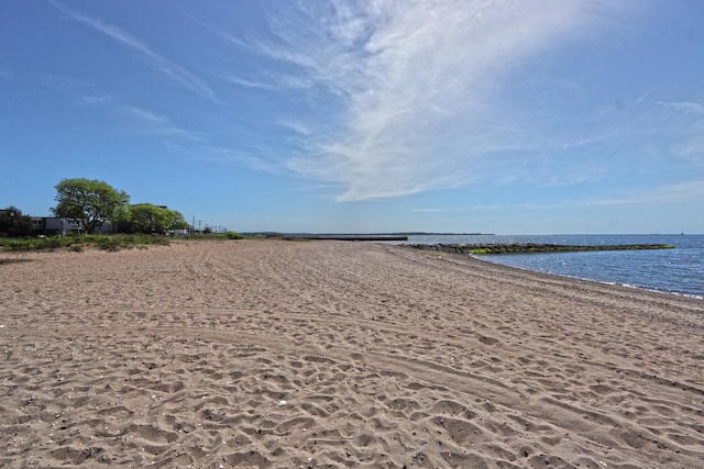 exterior space featuring a beach view