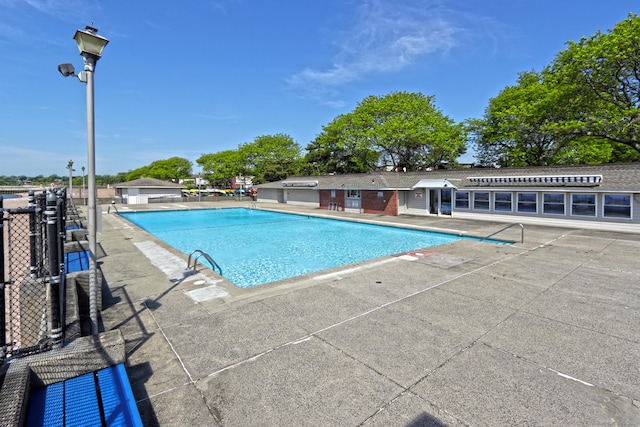 pool with a patio