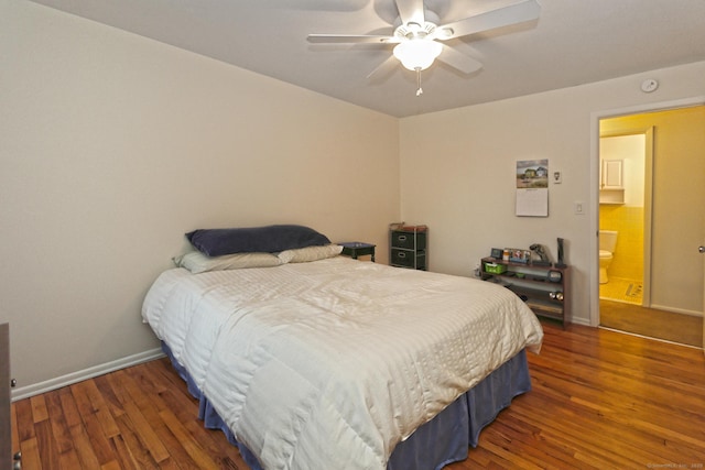 bedroom featuring ceiling fan, baseboards, and wood finished floors