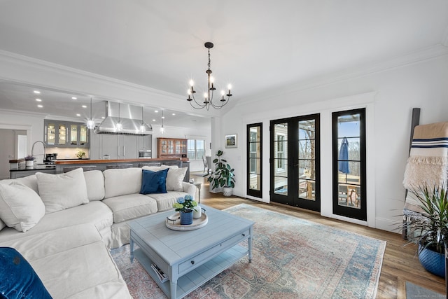 31 Birch Hill Rd, Lyme, CT 06371 - living room featuring a chandelier, crown molding, wood finished floors, recessed lighting, and baseboards