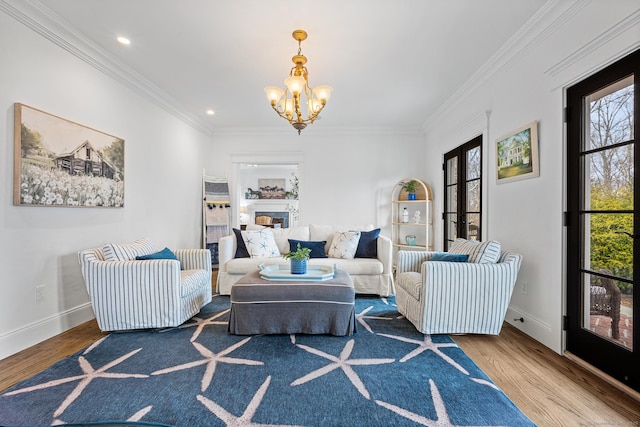 31 Birch Hill Rd, Lyme, CT 06371 - living area featuring a chandelier, wood finished floors, french doors, crown molding, and baseboards