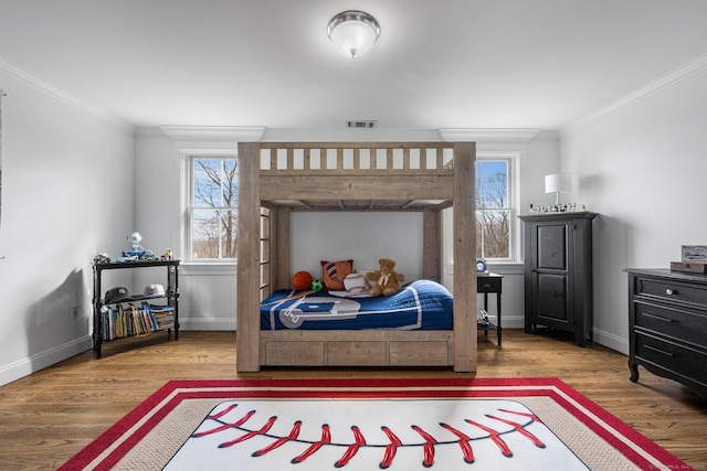 31 Birch Hill Rd, Lyme, CT 06371 - bedroom with ornamental molding, wood finished floors, multiple windows, and baseboards