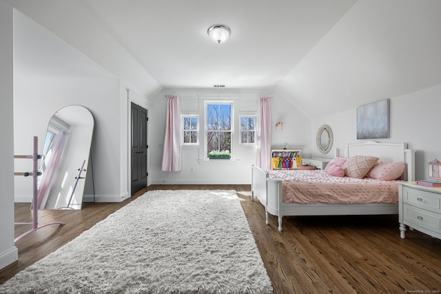 31 Birch Hill Rd, Lyme, CT 06371 - bedroom with lofted ceiling, dark wood finished floors, baseboards, and arched walkways