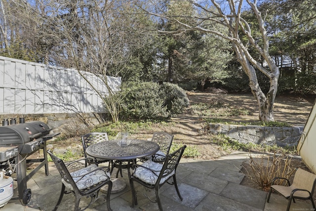 view of patio / terrace with fence and grilling area