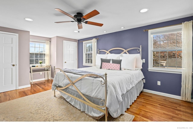 bedroom with recessed lighting, ceiling fan, baseboards, and wood finished floors