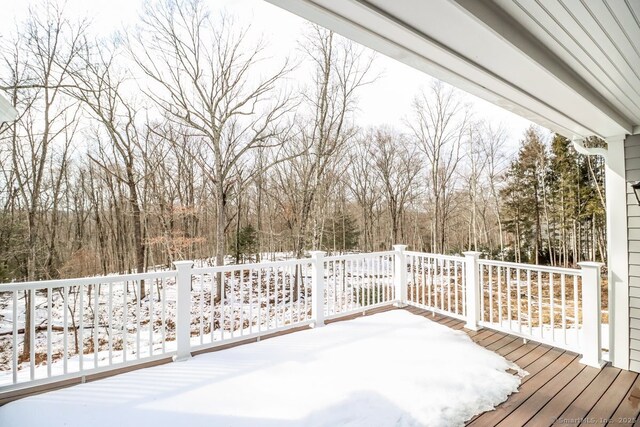 view of snow covered deck