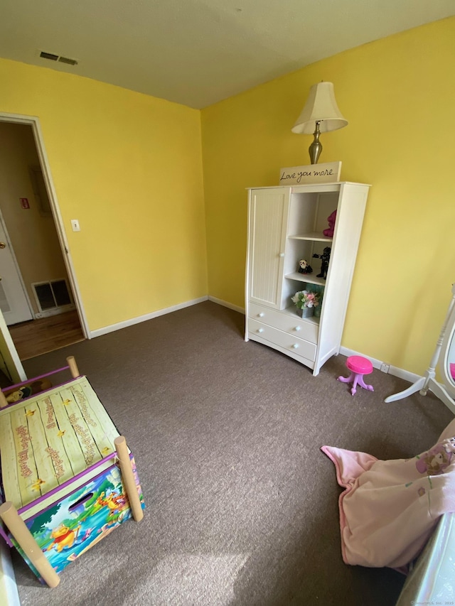 playroom featuring carpet flooring, visible vents, and baseboards