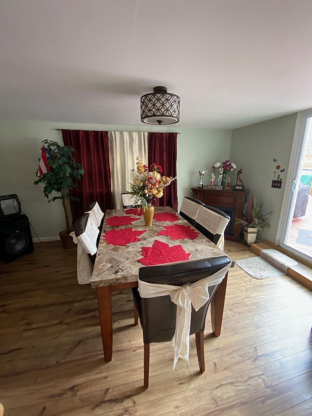 dining area featuring light wood-type flooring