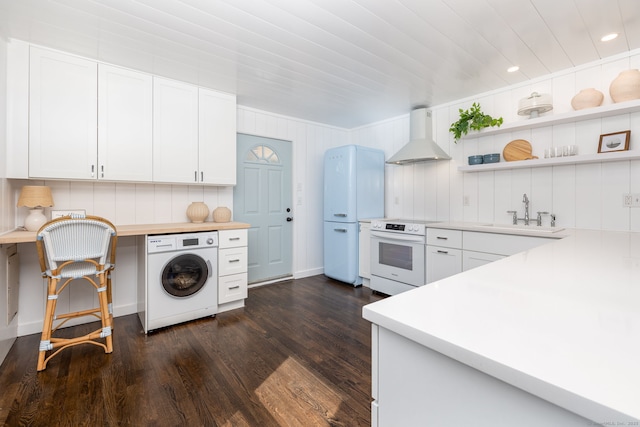 kitchen with a sink, ventilation hood, white range with electric cooktop, washer / clothes dryer, and dark wood-style flooring