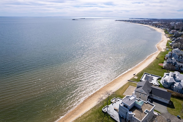 bird's eye view with a beach view and a water view