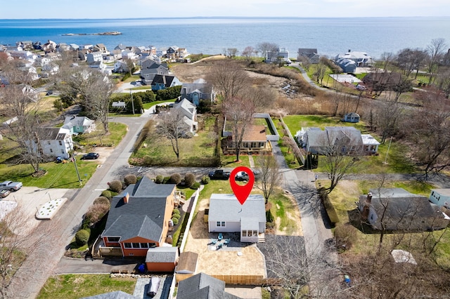 aerial view featuring a residential view and a water view