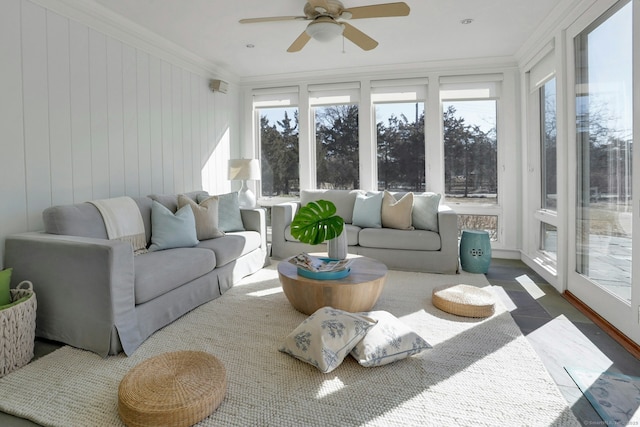 sunroom / solarium with ceiling fan