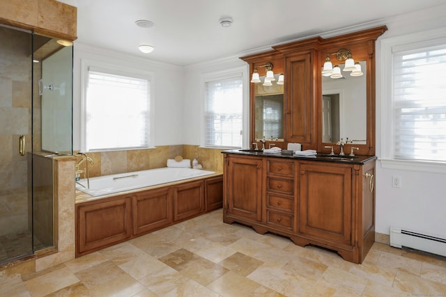 full bathroom featuring a sink, baseboard heating, plenty of natural light, and a garden tub