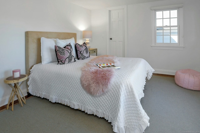 bedroom featuring baseboards