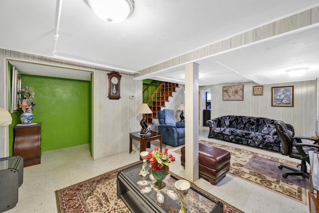 living room with tile patterned floors and stairway