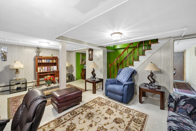 living room featuring stairway