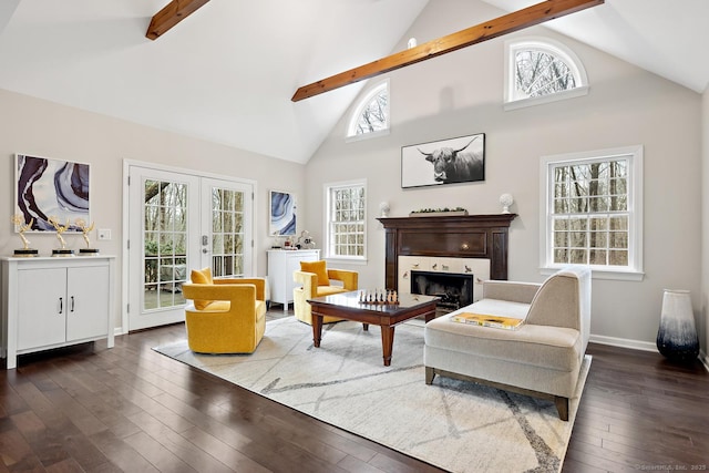 living area featuring baseboards, a tiled fireplace, dark wood-style floors, french doors, and beam ceiling