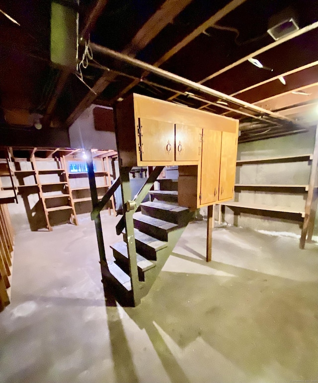 unfinished attic with stairs