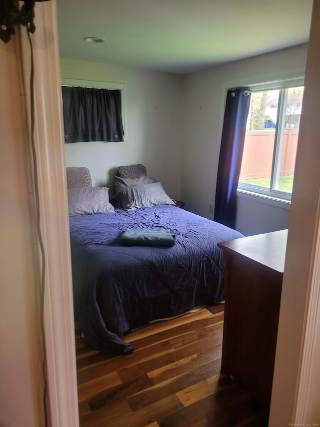 bedroom featuring wood finished floors