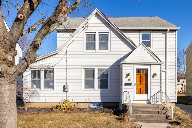 view of front of property with a shingled roof