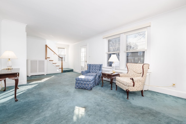 living area featuring stairs, crown molding, carpet, and baseboards