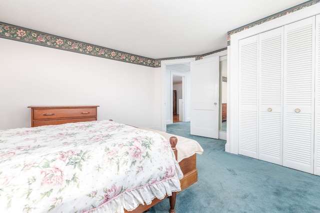 bedroom with a closet and light colored carpet