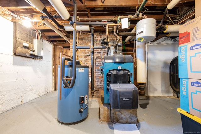 utilities featuring gas water heater and a heating unit