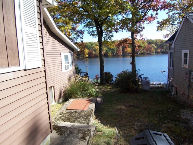 view of yard with a water view