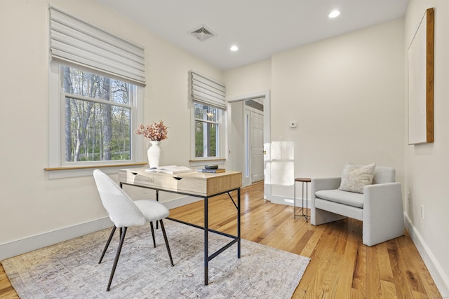 home office featuring recessed lighting, baseboards, visible vents, and light wood-type flooring