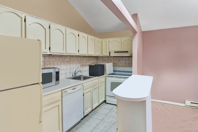 kitchen featuring light tile patterned floors, tasteful backsplash, a sink, white appliances, and under cabinet range hood