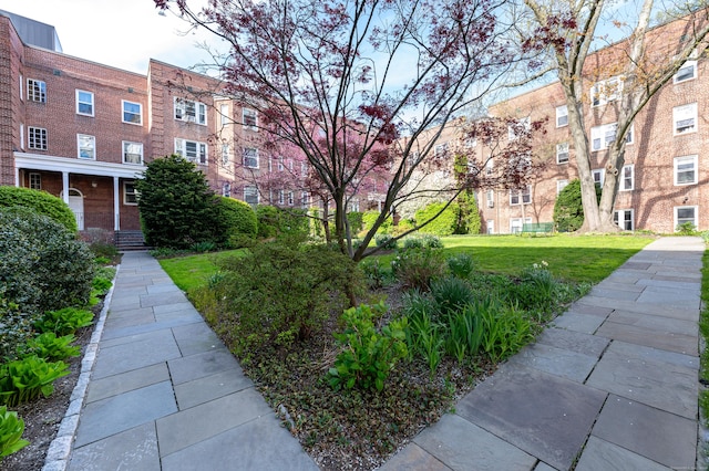 70 Strawberry Hill Ave Apt 3-3B, Stamford, CT 06902 - view of community featuring a lawn