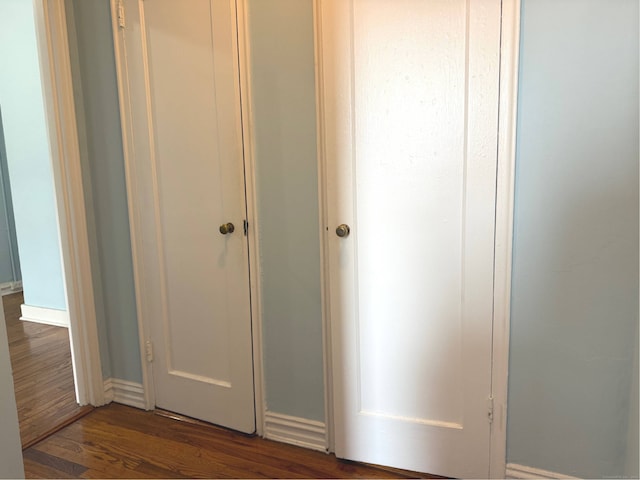 70 Strawberry Hill Ave Apt 3-3B, Stamford, CT 06902 - hall with dark wood-style floors and baseboards