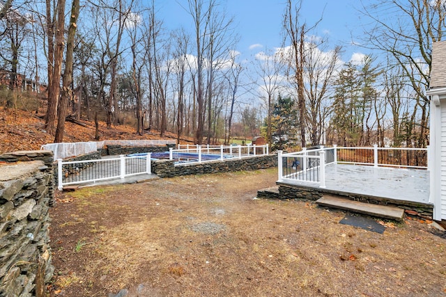 view of yard with a deck