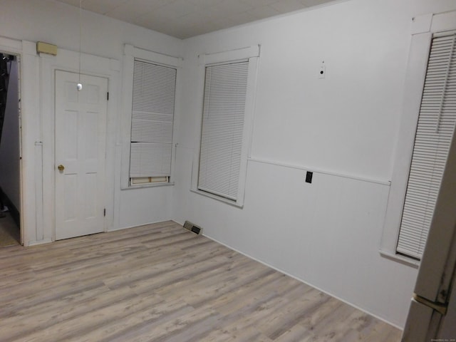 unfurnished bedroom featuring wood finished floors