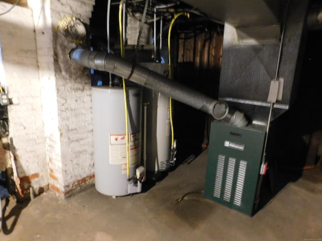 utility room featuring water heater