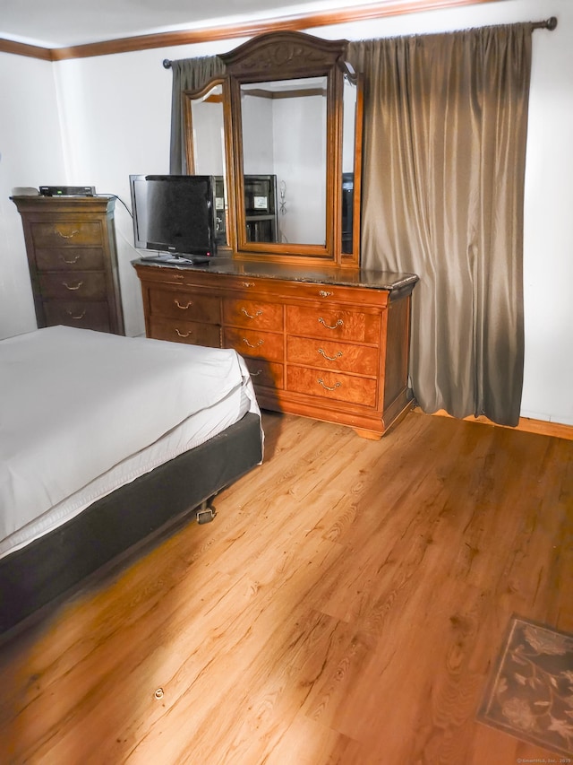 bedroom featuring light wood-type flooring