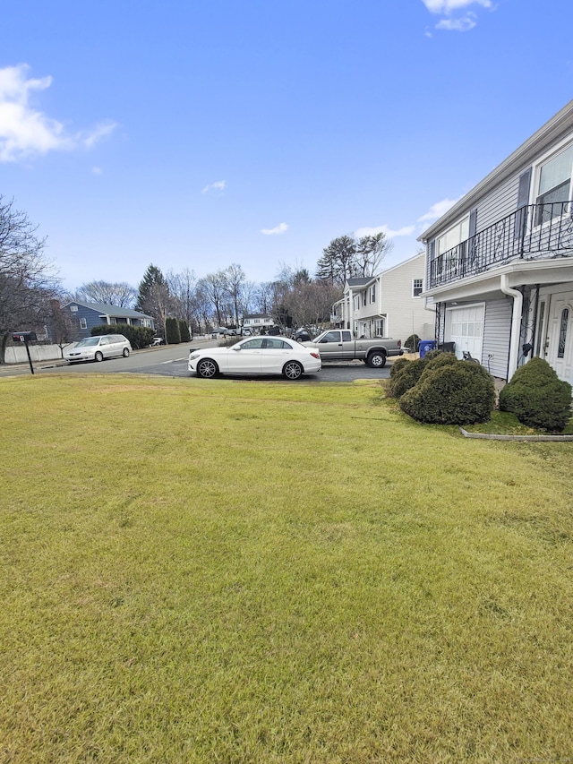 view of yard featuring a garage