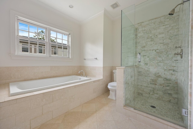 bathroom with a garden tub, crown molding, visible vents, toilet, and tile patterned floors