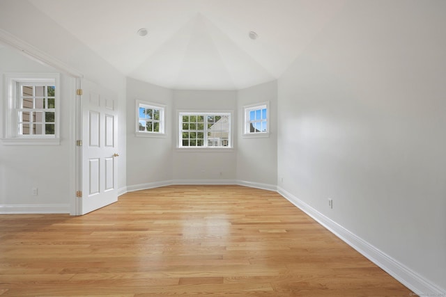 empty room with light wood-style floors and baseboards