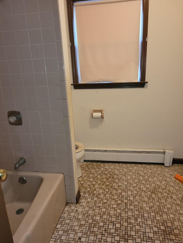 full bathroom featuring toilet and a baseboard radiator